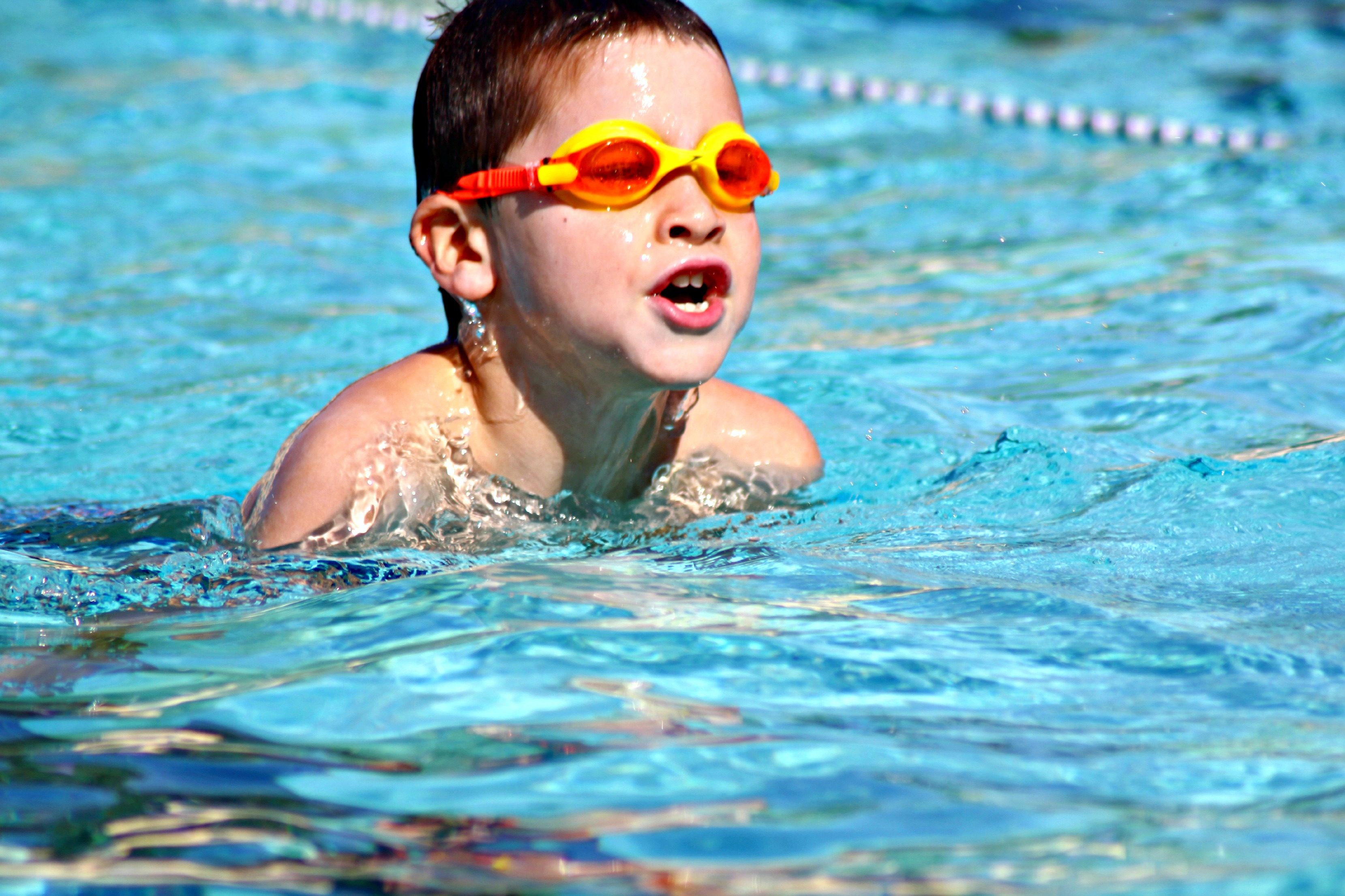 Children learning to swim